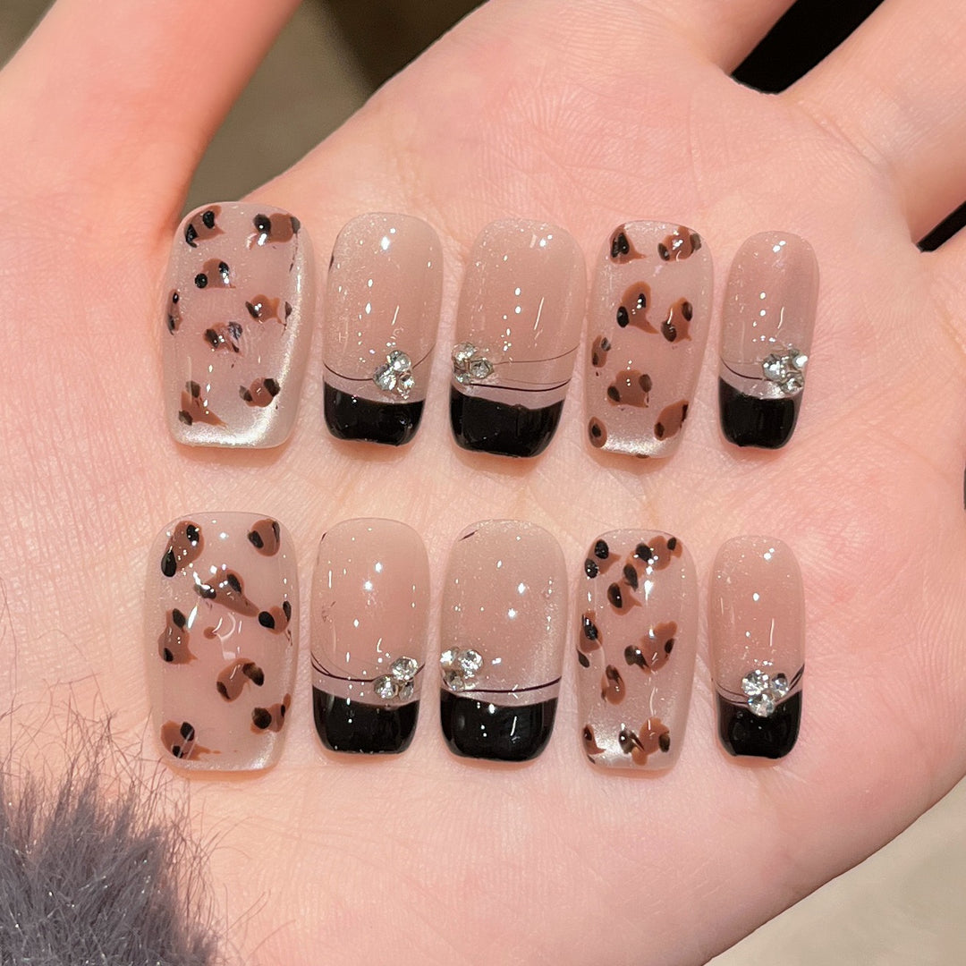 Elegant Nail Art Extensions with Pearl Accents Stornfield