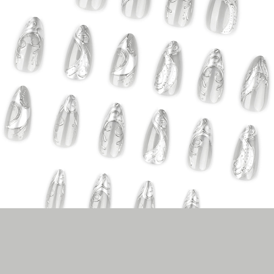 Artistic stiletto nails with elegant silver design Stornfield