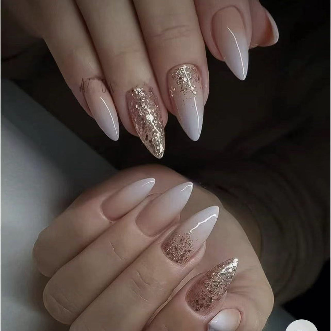Elegant artificial nails with glitter accents and modern designs Stornfield