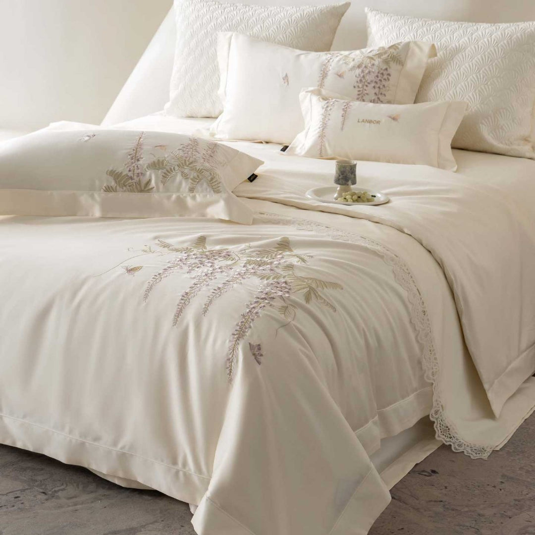 Satin bedding set with wisteria embroidery and fine piping