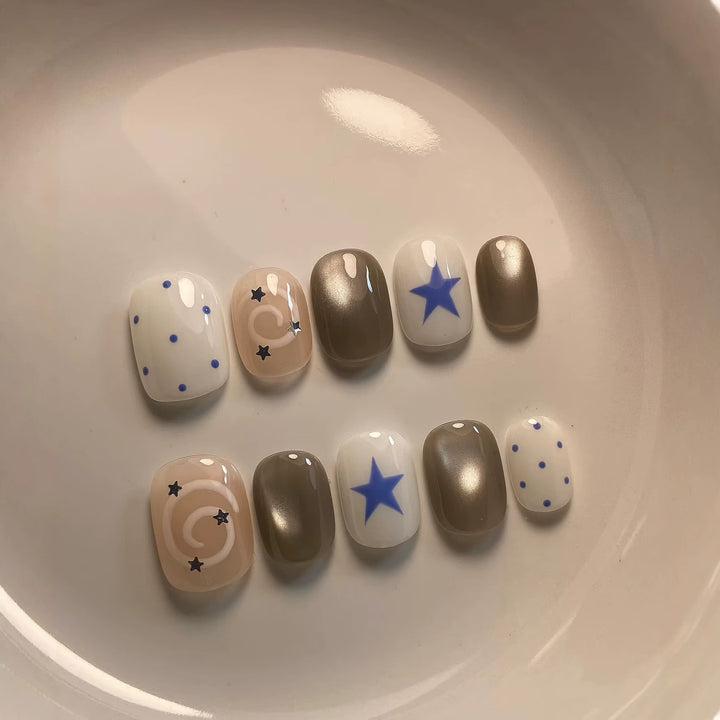 Artistic Press-On Nail Set with Whimsical Star and Dot Designs