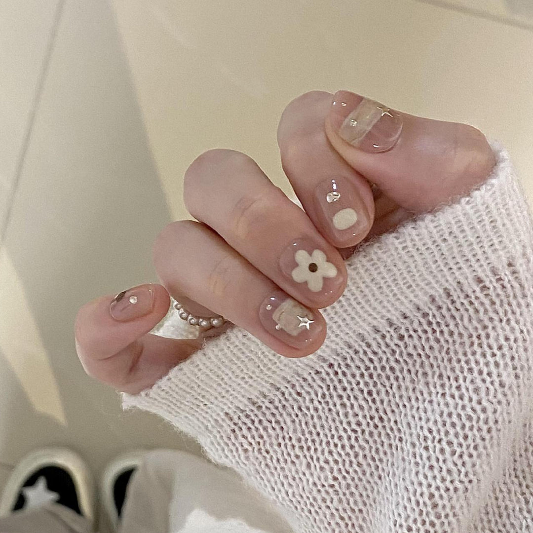 Artificial nails with elegant floral designs Stornfield
