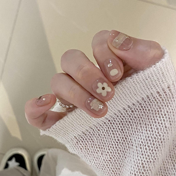 Artificial nails with elegant floral designs Stornfield