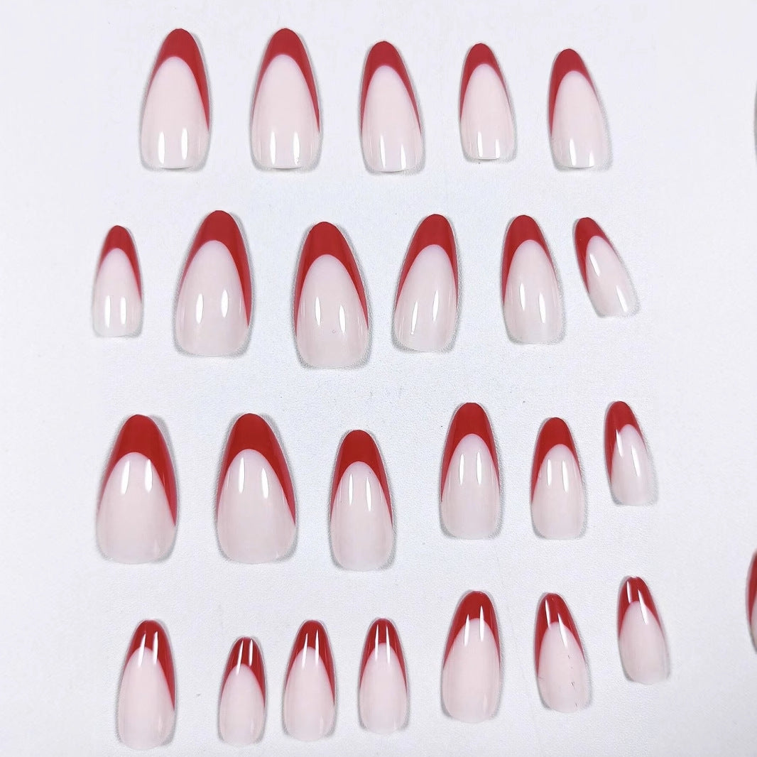 Artificial nail set with stylish pointed design and elegant color gradients Stornfield