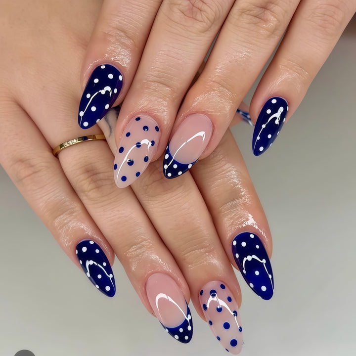 Artificial nails in modern polka dot design Stornfield