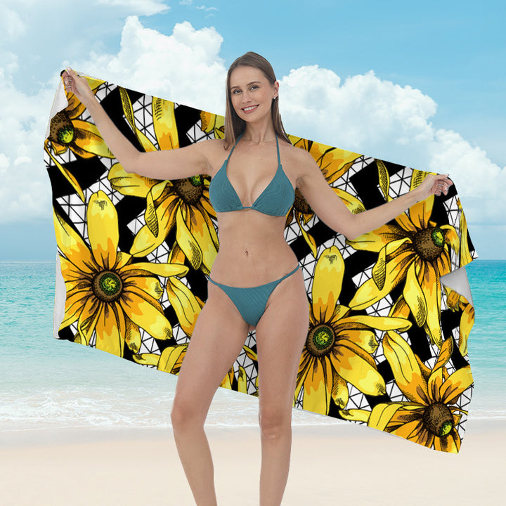 Beach towel with vibrant tropical plant motif Stornfield