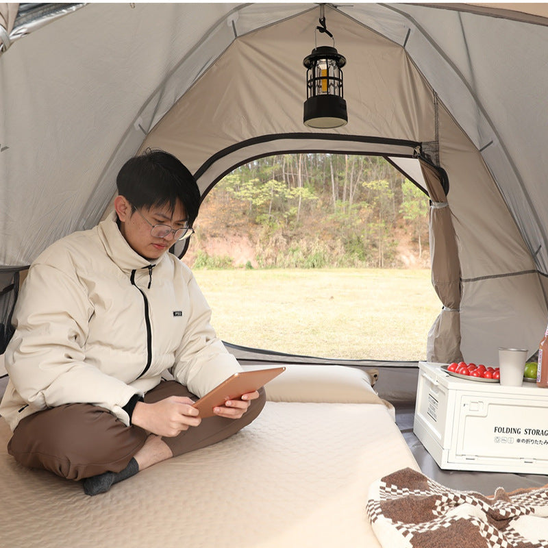 double connectable inflatable camping mattress with integrated dual pillows, egg-crate comfort surface and compact carry sack Stornfield