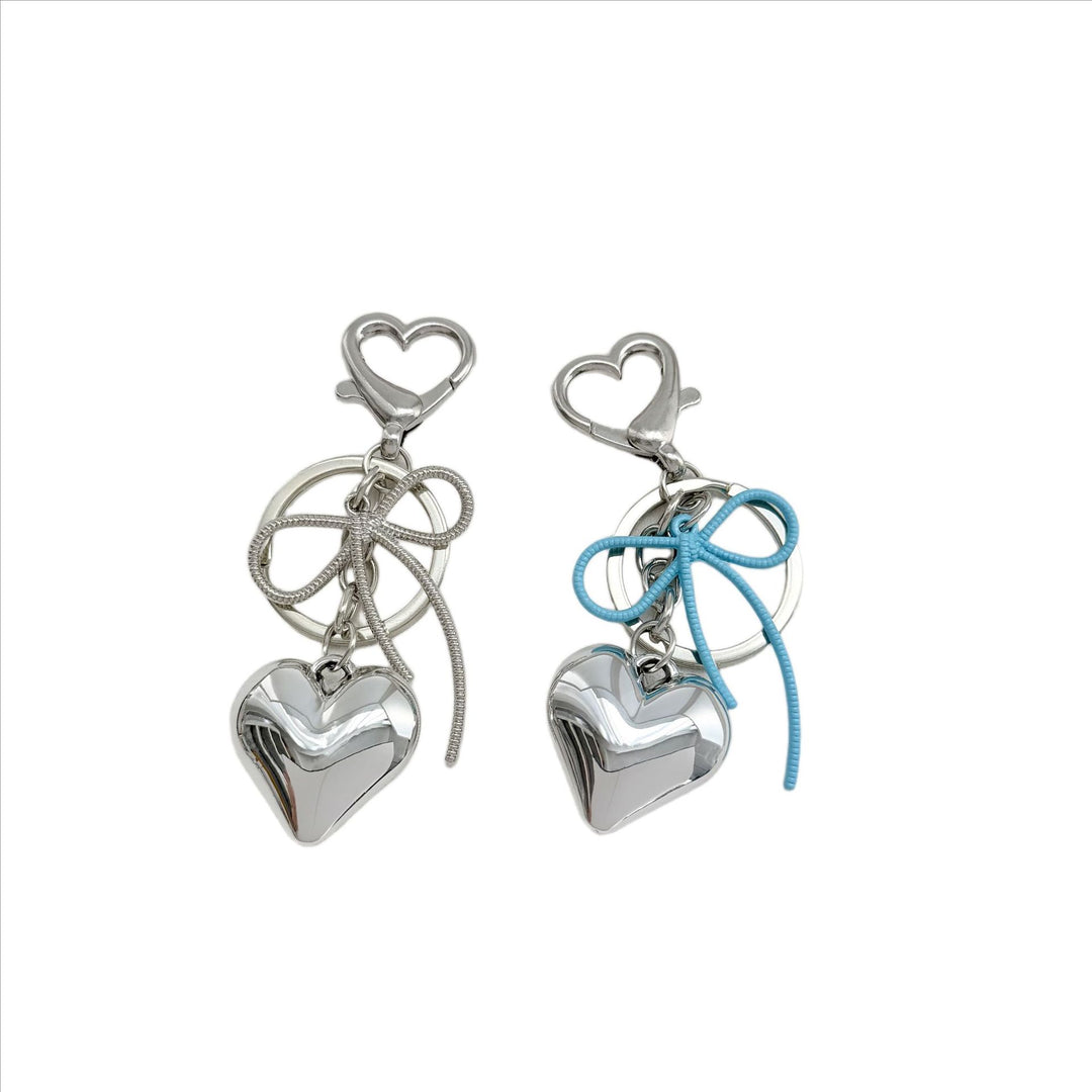 Heart-Shaped Metallic Keychain with Decorative Bow Stornfield