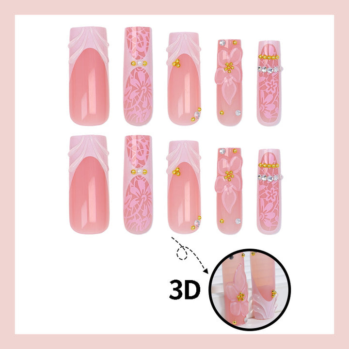Artificial nail set with floral designs and sparkling accents Stornfield