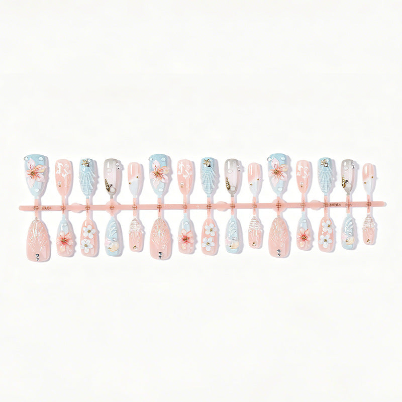Artificial nail set with maritime motifs and colorful flowers Stornfield