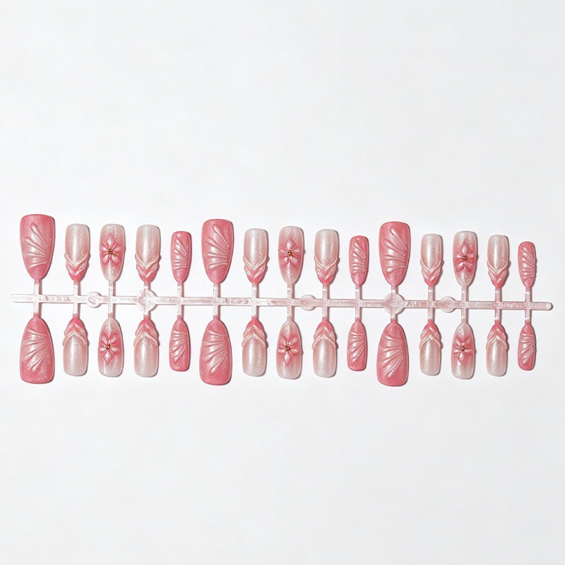 Artificial nail set with filigree flowers and glitter accents Stornfield