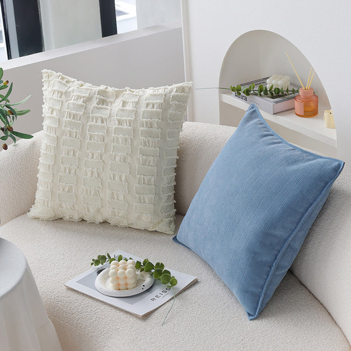 Decorative cushion with textured weave design