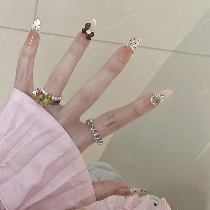 Artistic Stiletto Press-On Nail Set with Floral Embellishments Stornfield