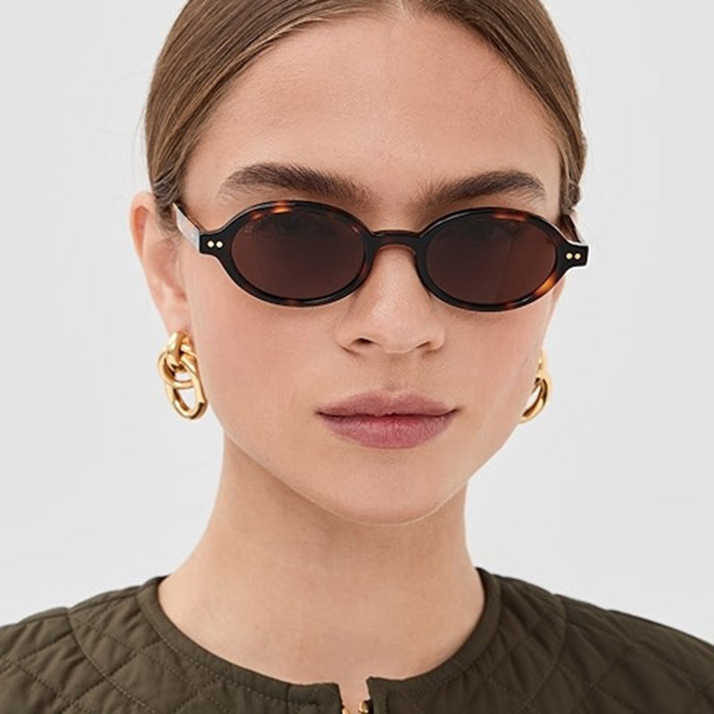 Ladies fashionable oval-shaped sunglasses with fancy frame Stornfield