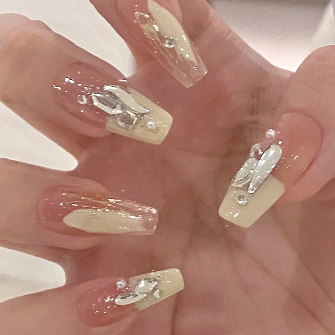 Artificial nails with heart design and glitter accents Stornfield