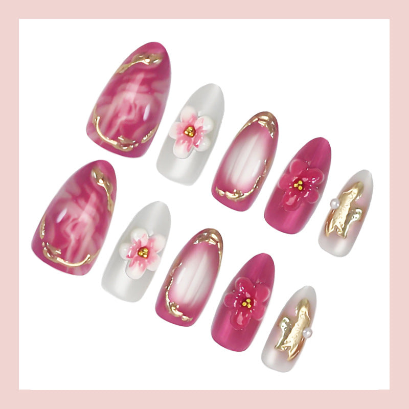 Acrylic nail set with floral accents and glitter details Stornfield