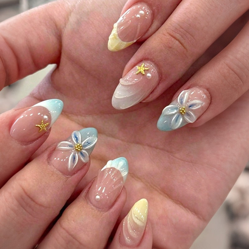 Art nail set with elegant flower design and stylish color gradients Stornfield