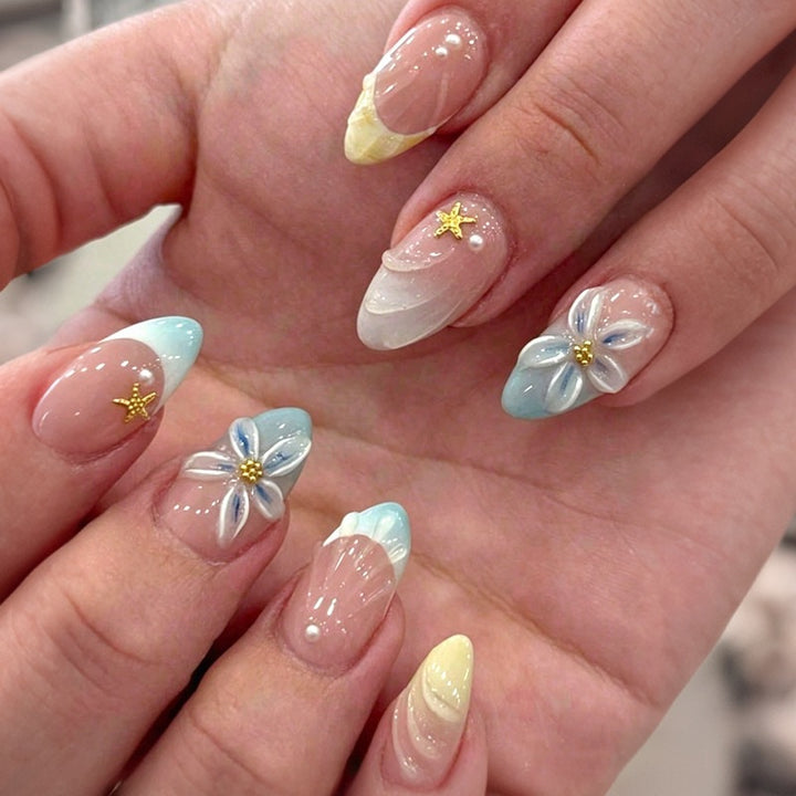 Art nail set with elegant flower design and stylish color gradients Stornfield