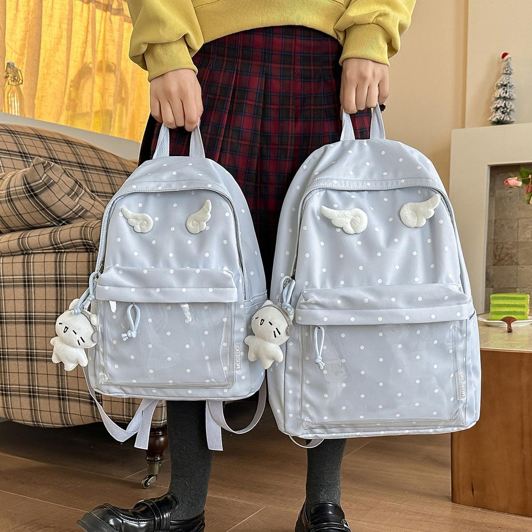 Polka Dot Patterned Backpack with Playful Wing Accents Stornfield