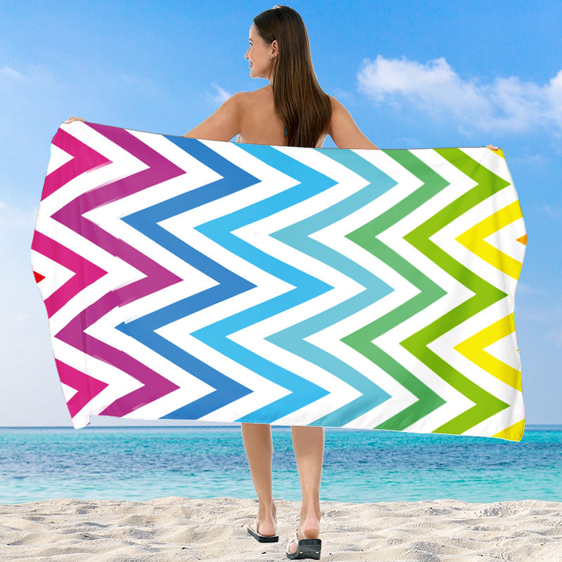 Beach towel with vibrant gradient color and stylish striped design Stornfield