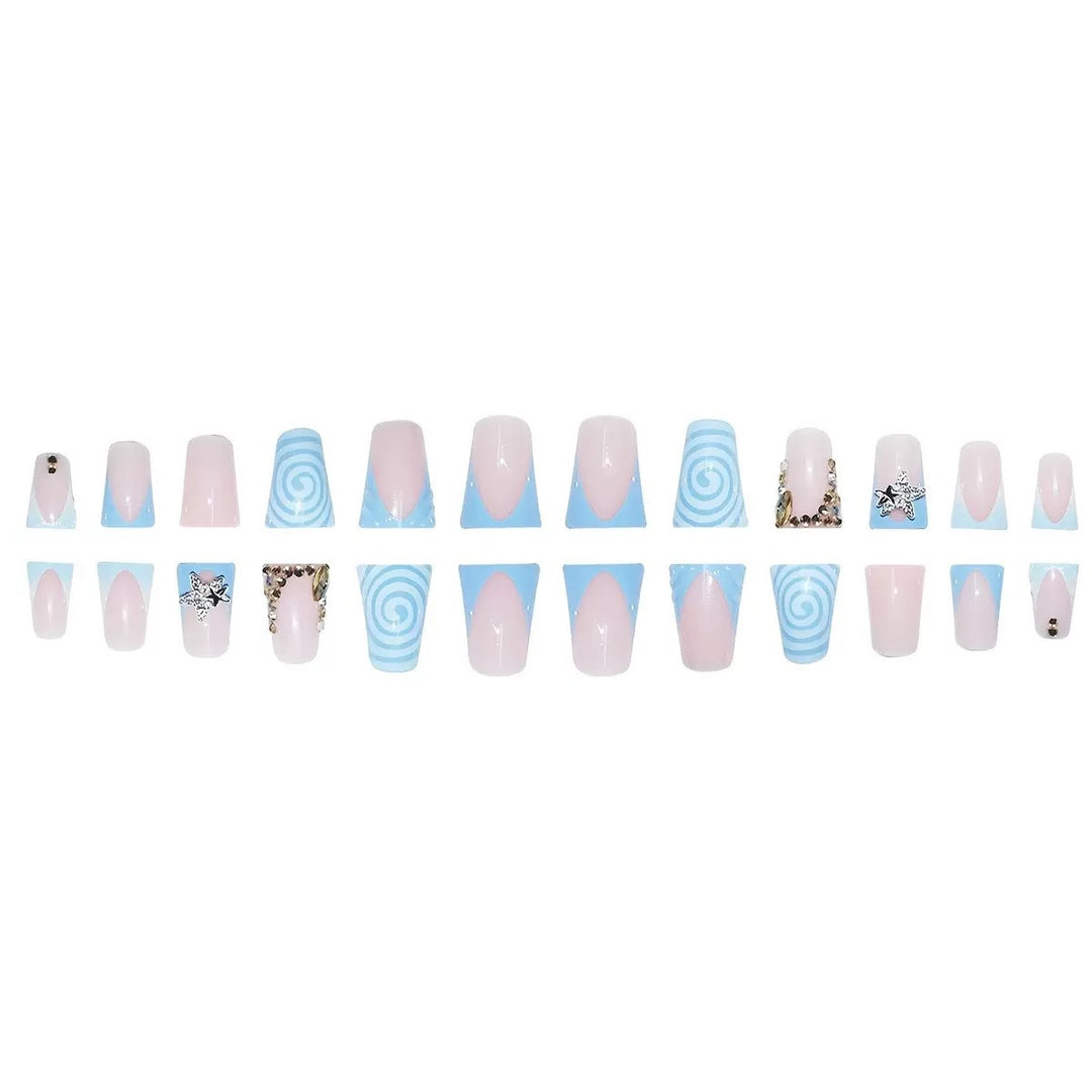 Artistic Long Press-On Nail Design with 3D Star Accents Stornfield