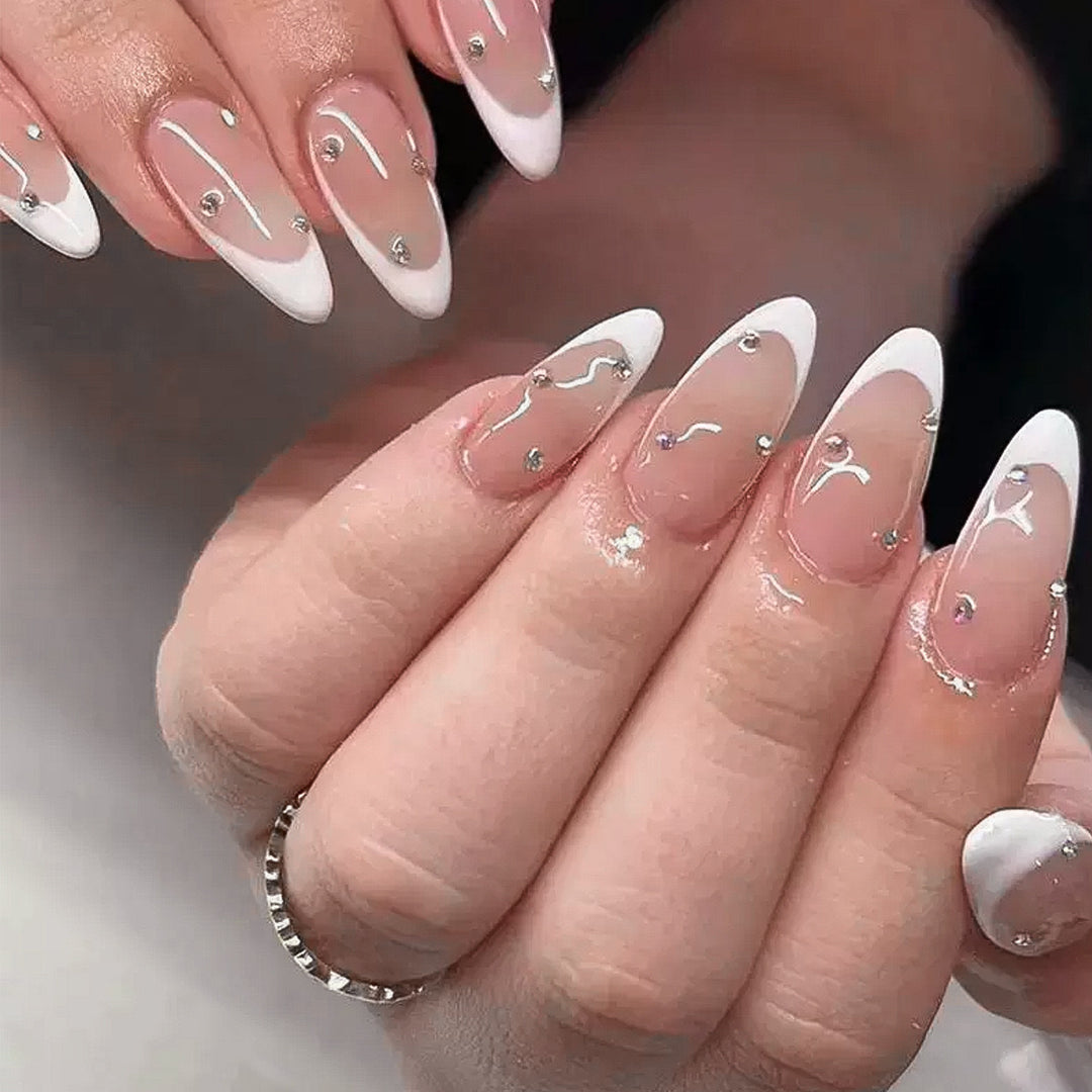 Nail kit with elegant French tips and sparkling accents Stornfield