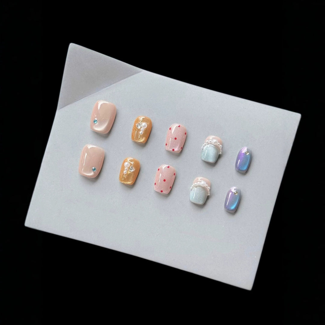 Decorative Press-On Nail Art Set with Unique Gem and Pearl Accents