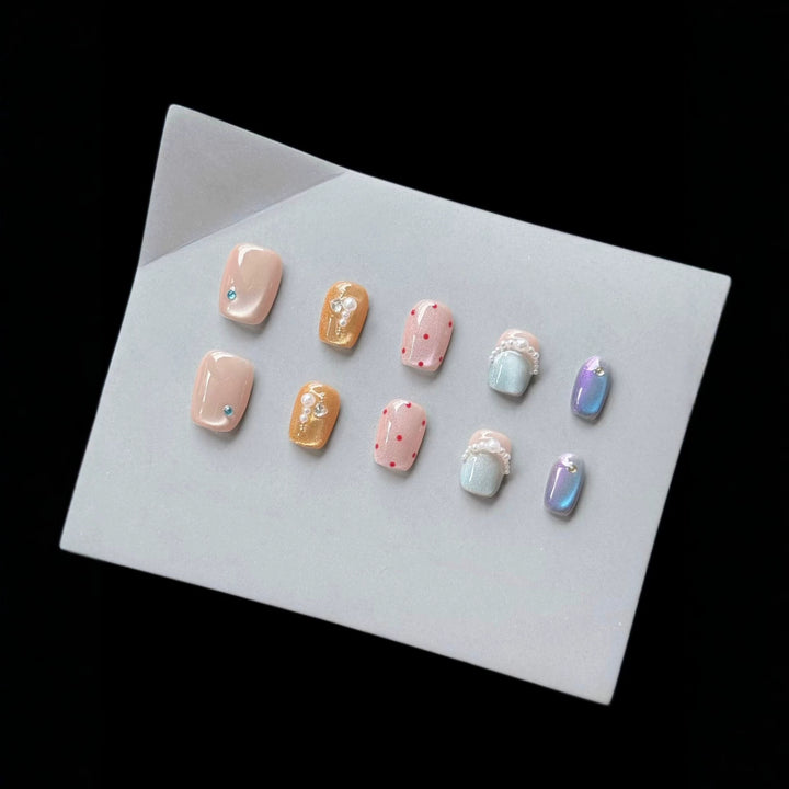 Decorative Press-On Nail Art Set with Unique Gem and Pearl Accents
