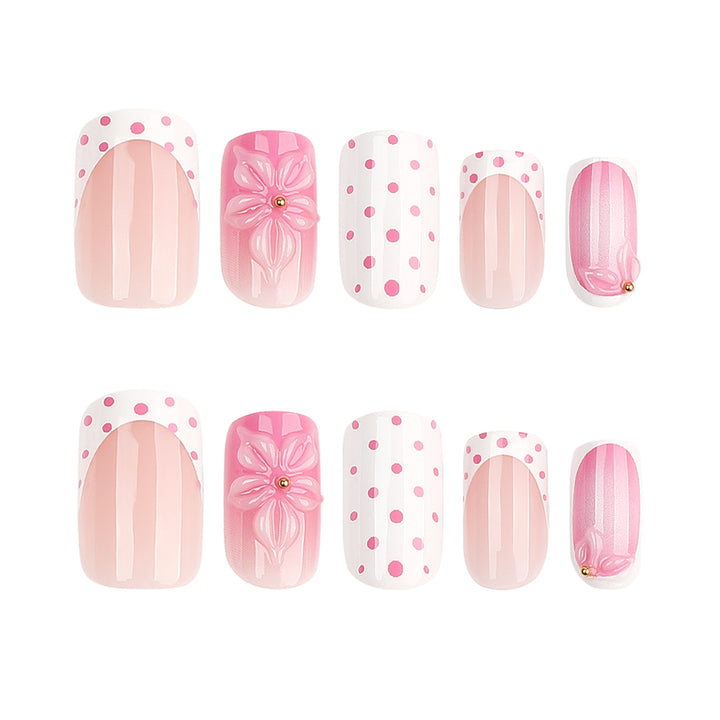 Artificial nail art with trendy flower decor and dots Stornfield