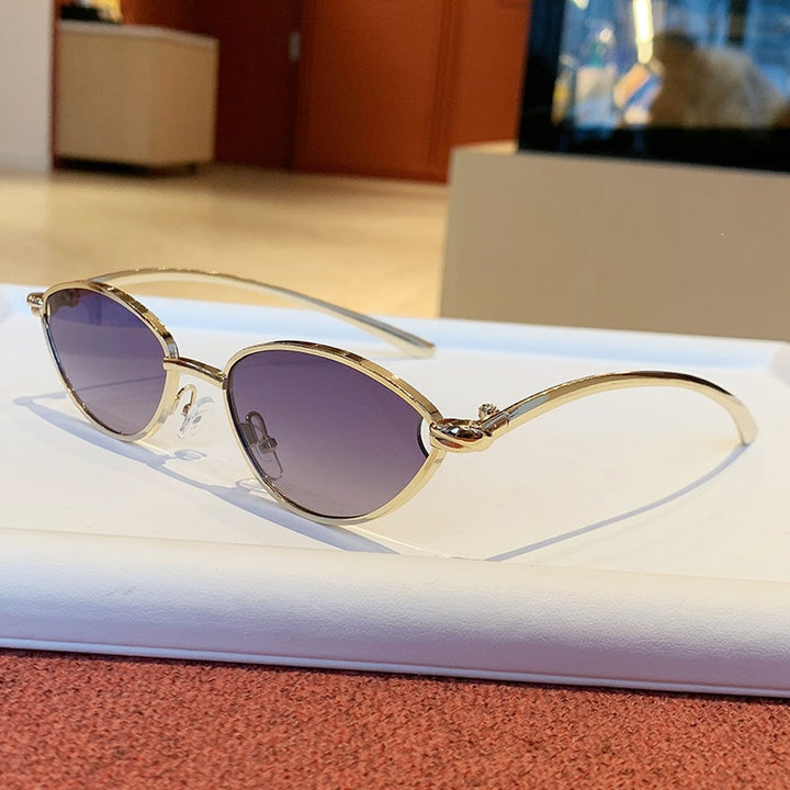 Women's designer sunglasses with elegant metal frame and protective lenses Stornfield