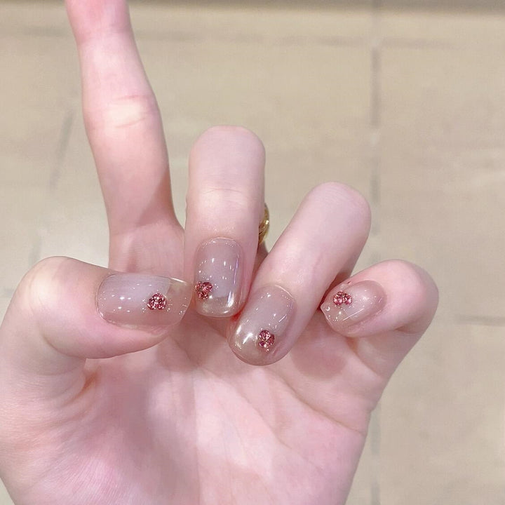 Artificial nails with elegant glitter details Stornfield