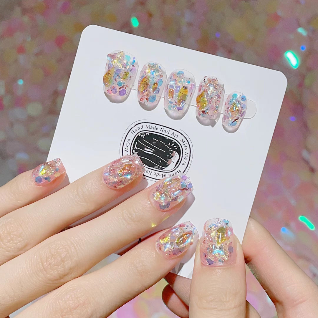 Artful nail tips with glitter accents Stornfield