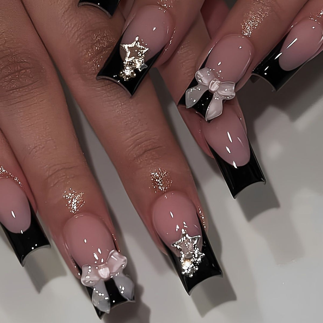 Glamorous artificial nail set with 3D bows and glitter decorations Stornfield