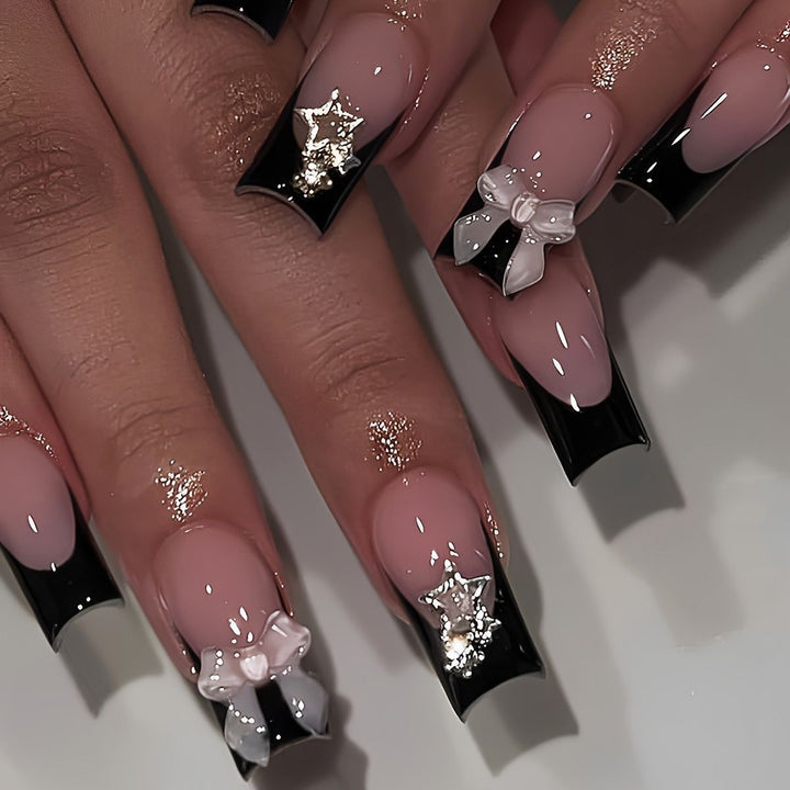 Glamorous artificial nail set with 3D bows and glitter decorations Stornfield