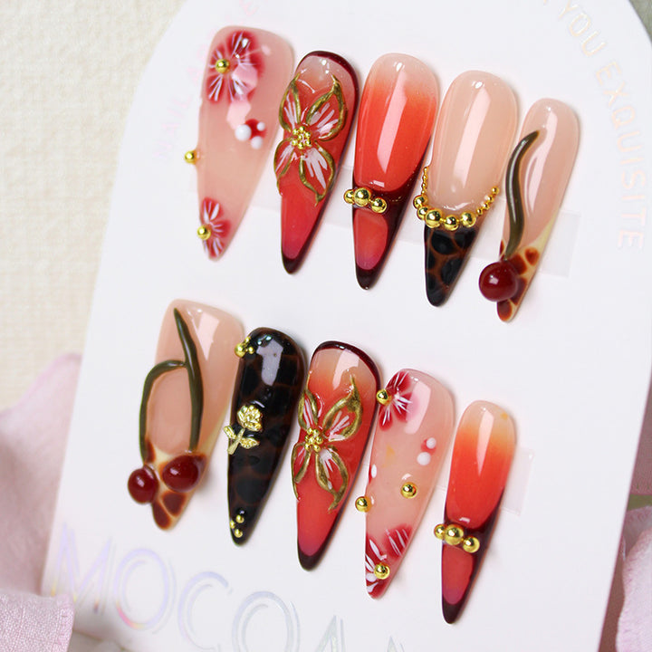 Artificial nail set with elegant floral decorations and modern accents Stornfield