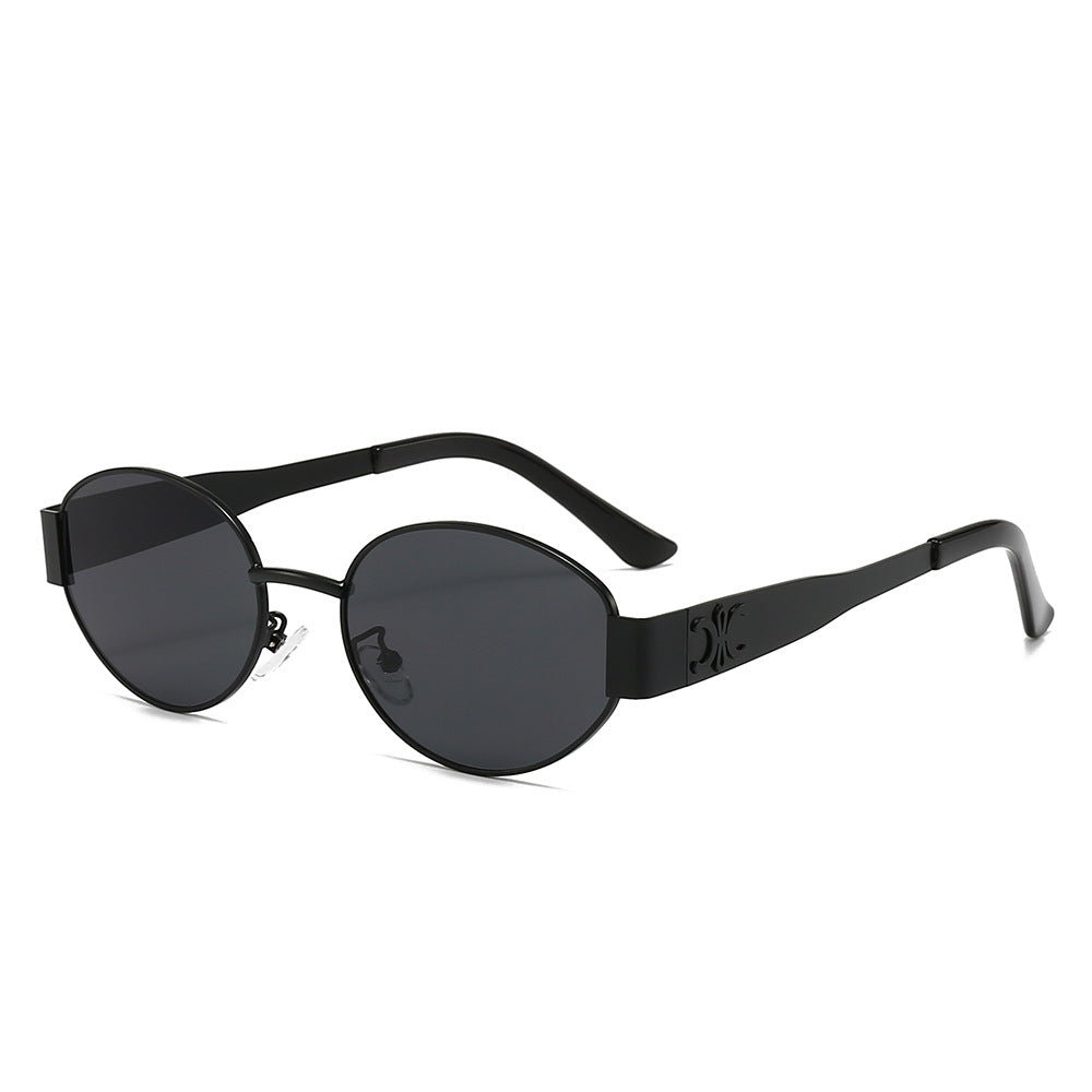 Women's designer sunglasses with elegant oval frame and unique accents Stornfield