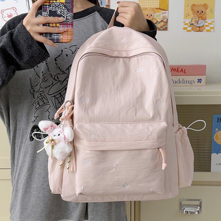 Playful backpack with fine embroidery Stornfield