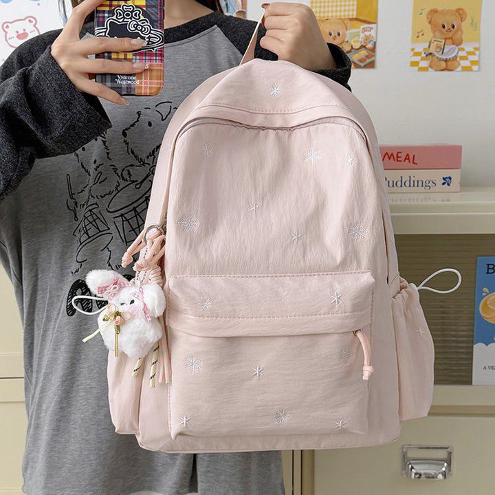 Playful backpack with fine embroidery Stornfield