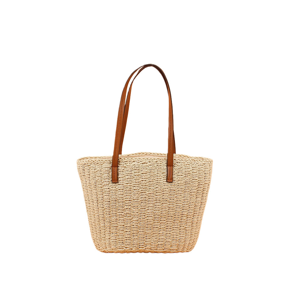 Handbag made of hand-woven natural material with sturdy leather handles Stornfield