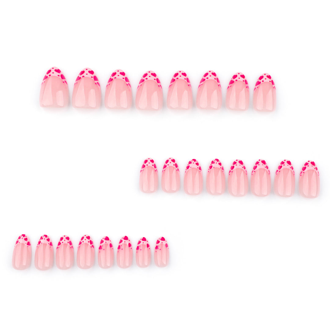 Artificial nail extensions with heart tip accents Stornfield