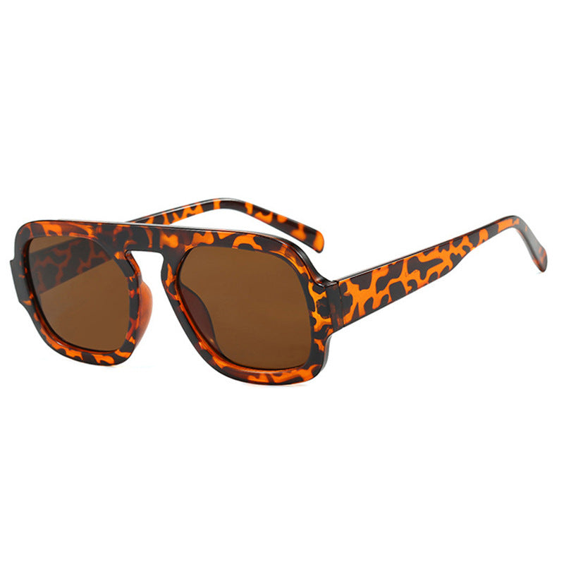 Ladies stylish square sunglasses with wide frame and UV protection Stornfield