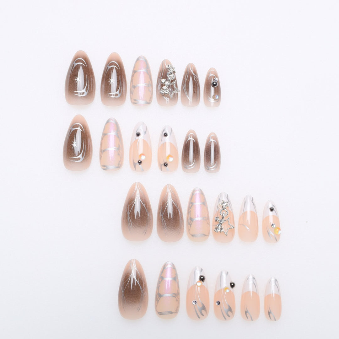 Artistic Stiletto Nail Extensions with Metallic Accents Stornfield