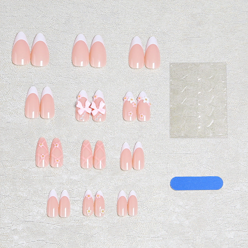 Artful Nail Tips with Ribbons and Floral Decorations Stornfield