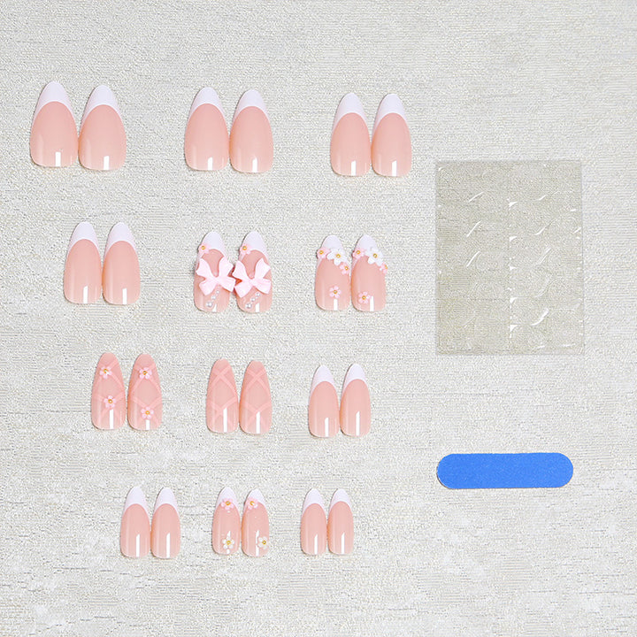 Artful Nail Tips with Ribbons and Floral Decorations Stornfield