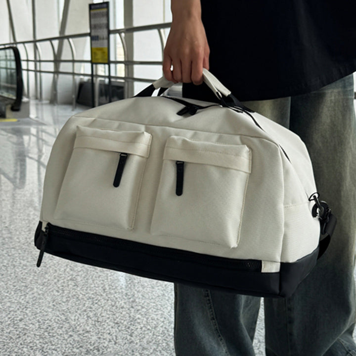 Sporty travel bag with two additional outer pockets Stornfield