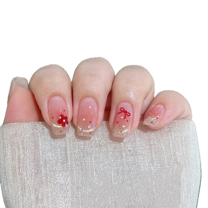 Decorative Press-On Nail Set with Floral and Bow Accents Stornfield