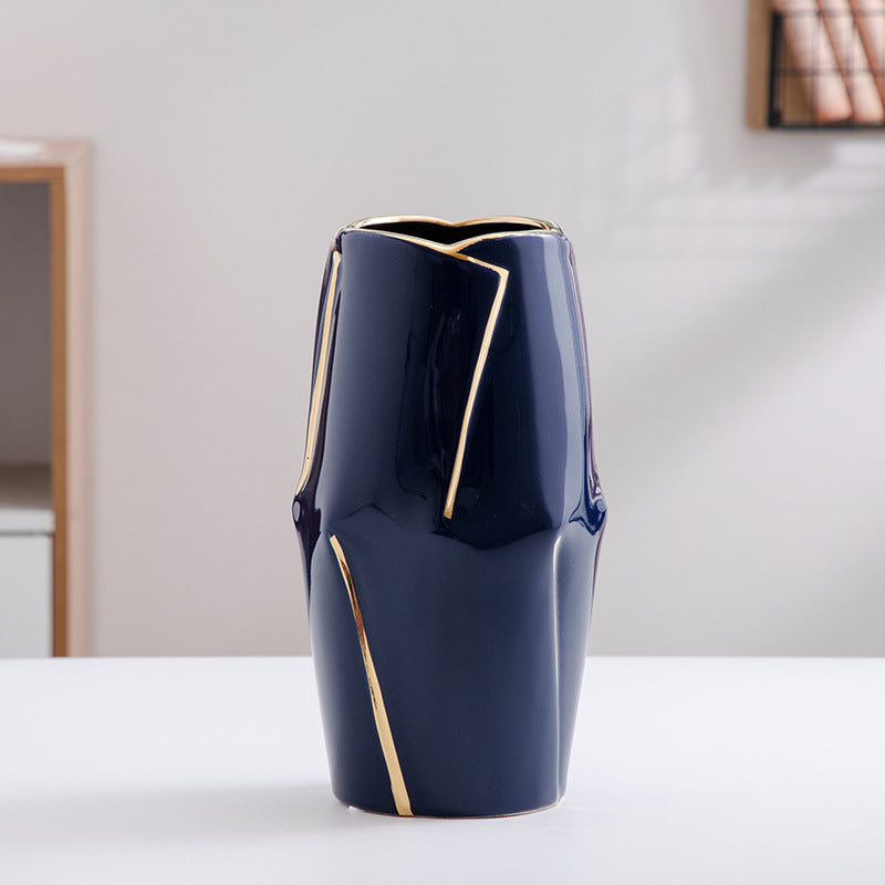 Decorative ceramic vase with golden accents Stornfield