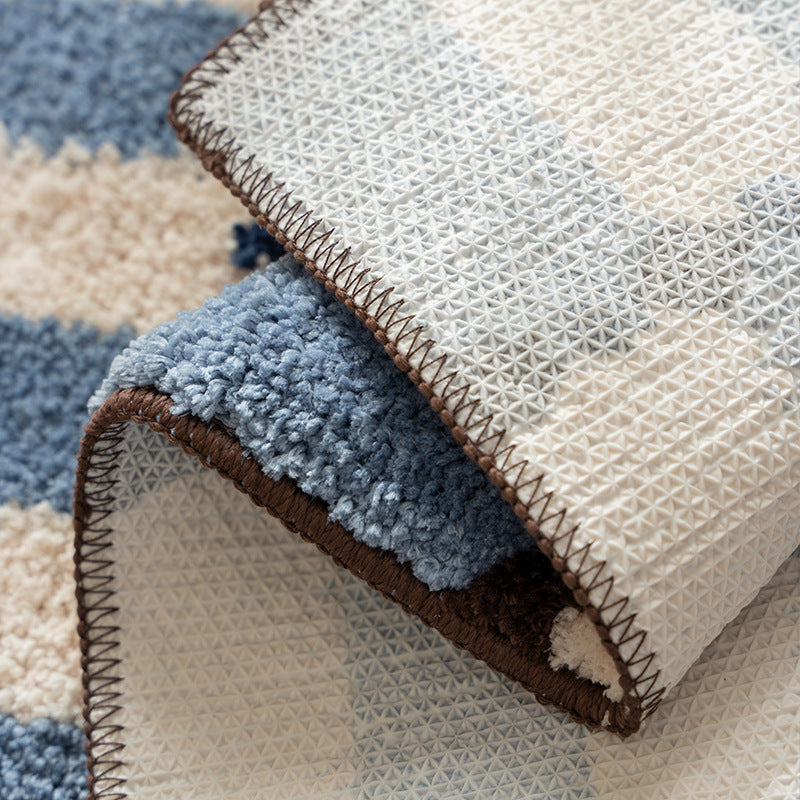 Square high-pile bath mat with textured block stripe look and contrasting edging