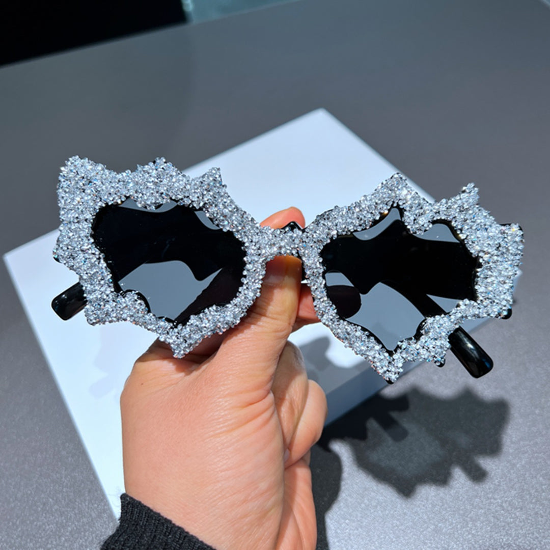 Ladies creative sunglasses in an extravagant design with glitter embellishments Stornfield