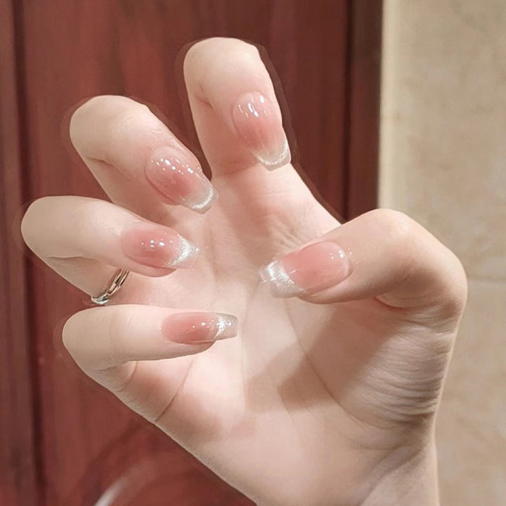 Nail set with elegant French design and sparkling accents Stornfield
